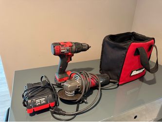 Bauer 20v drill with battery and charger and angle grinder