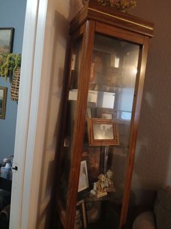 Curio cabinet brown and gold