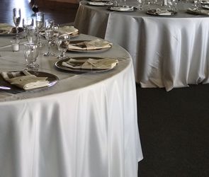 Ivory satin linens for 60 inch table