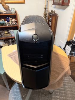 The Alienware Aurora R4 Gaming Desktop is a high-performance system designed for gaming enthusiasts. Featuring an Intel i7-3820 processor, 32GB of RAM