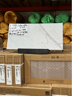 Tile floor Calacatta Cool 12in x24in Grade B 17.60 SqFt 9 Unit per box Price $.99 per sqft