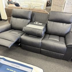 Reclining Sofa And Rocking Reclining Love Seat Made By Ashley 