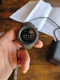 Garmin An Suunto Alpha Watch