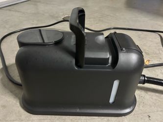 Portable steam cleaner