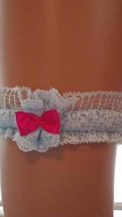 Garter light blue with pink ribbon