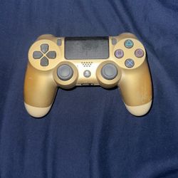 White and Gold PS4 Controllers