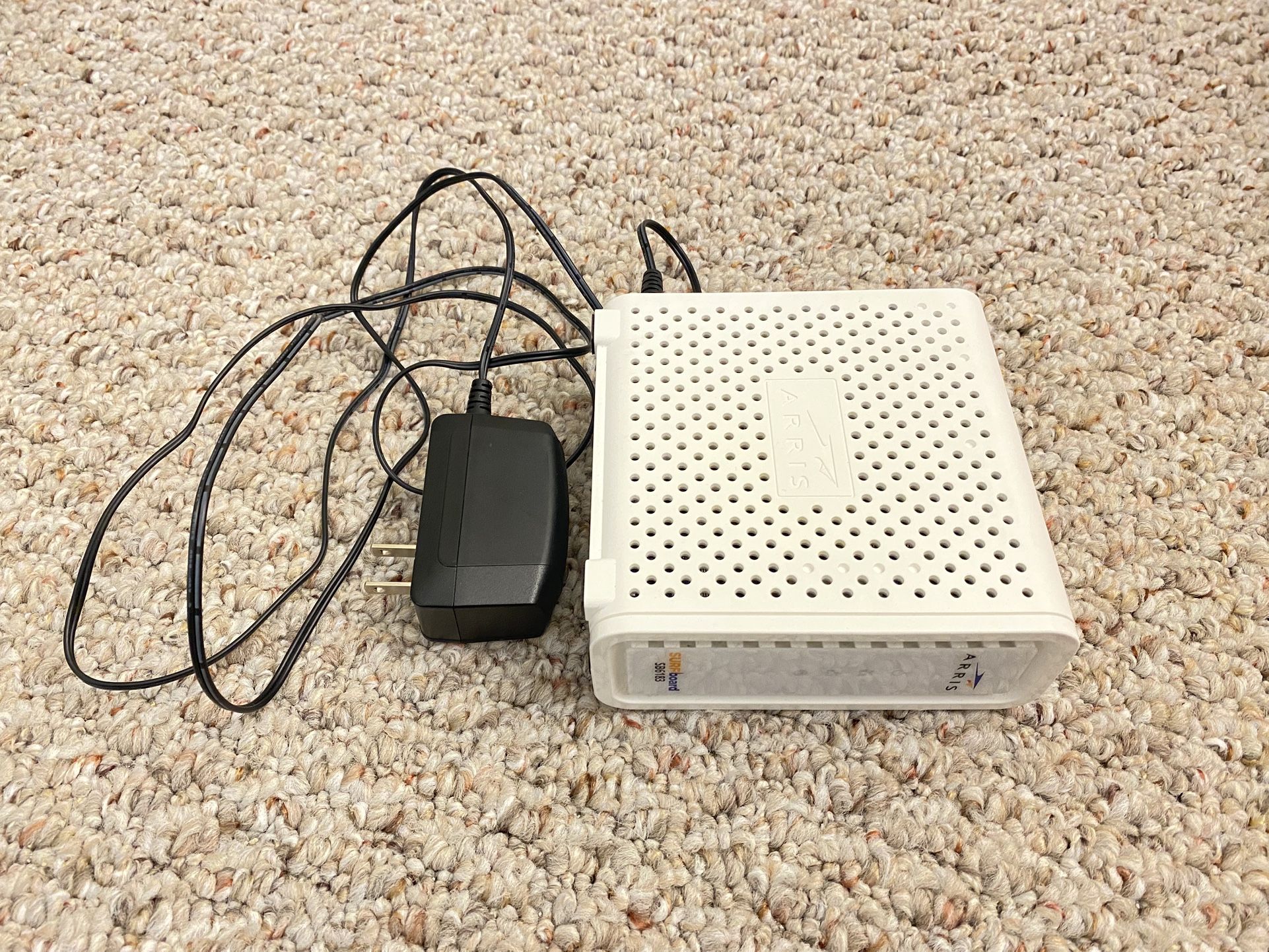 Arris SB6183 Cable Modem with coax cable and Ethernet cable