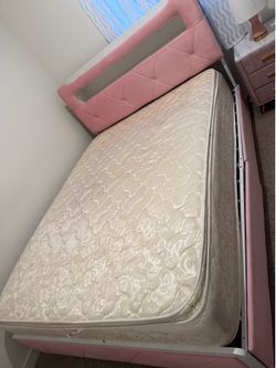 Queen pink bed