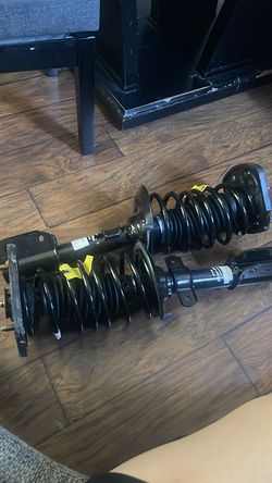 Strut mount and spring