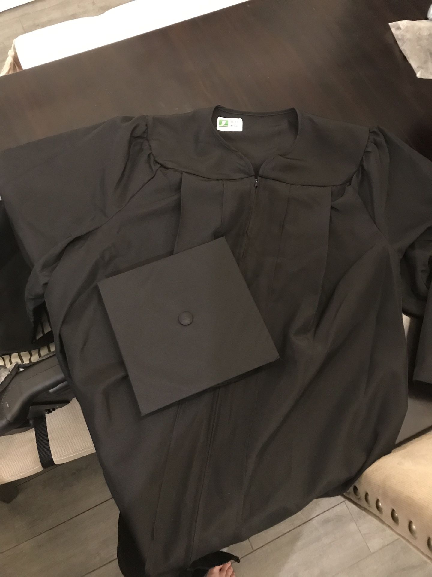 Solid black graduation cap and gown 5’11”