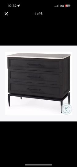 Black accent cabinet with metal base missing top