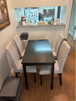 Dining table with 4 chairs.