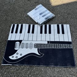 2 Brand New Small Music Rugs $25 Each