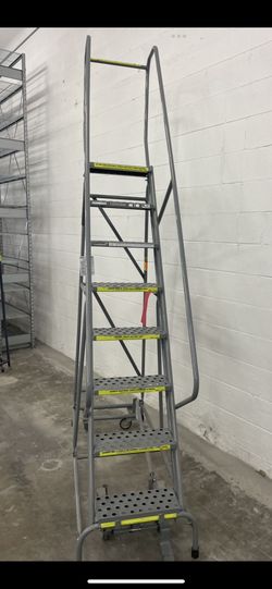 Industrial rolling stairs and shelving available