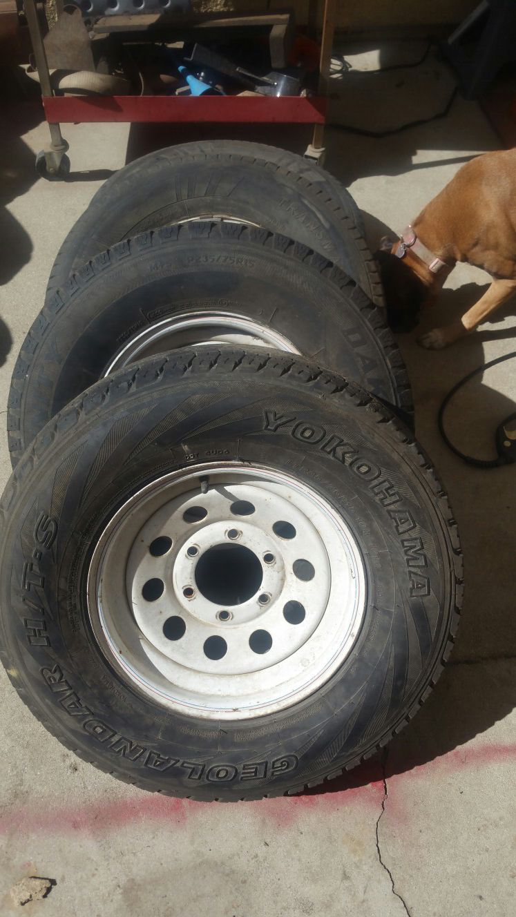 Have a set of 4 235/75/15 used tires and wheels, 6 lug trailer.