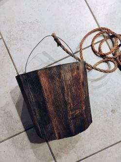 Vintage rustic wooden bucket pail