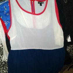 WOMEN'S SLEEVELESS SHIRT....