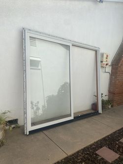 Clad sliding door patio  Aluminum outside wood inside  Jeldwen manufactured  OX door.