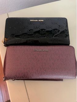 Micheal Kors wallets.  Both for $20