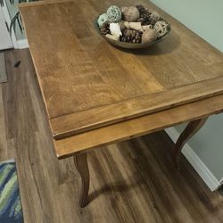 Antique extendable dining table