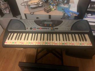 Yamaha digital  piano  psr 240 with  stand and charger