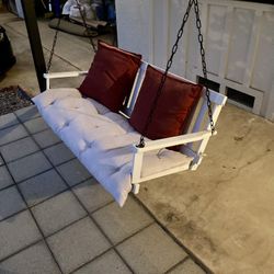 Porch Swing And Adirondack Chairs