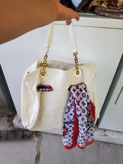 Cream bag purse.
