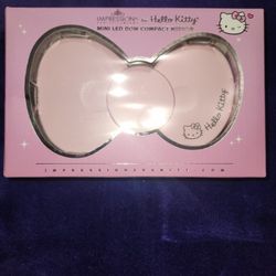 Hello kitty bow mirror