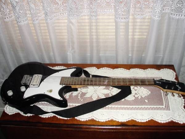 First Act .. ME316 .. Black and White .. Solid Body .. Electric Guitar .. Good Condition