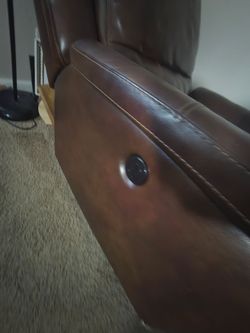 Electric reclining love seat and chair .