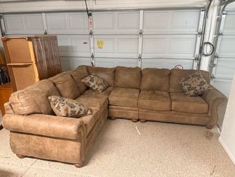 Large Brown Sectional Sofa with Nailhead Trim