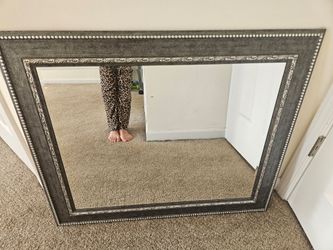 Mirror, Mirrored wall signs and a lamp