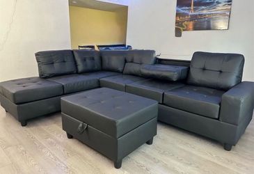 NEW IN BOX  Reversible Sectional + Ottoman -Black Pu Sectional FINANCE AVAILABLE $54 down pmt
