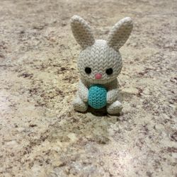 Knitted Bunny Holding Egg