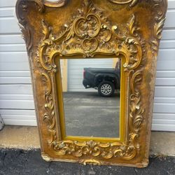 Ornate gold Renaissance mirror.. With engraving from 1966… 43“ x 29” $300