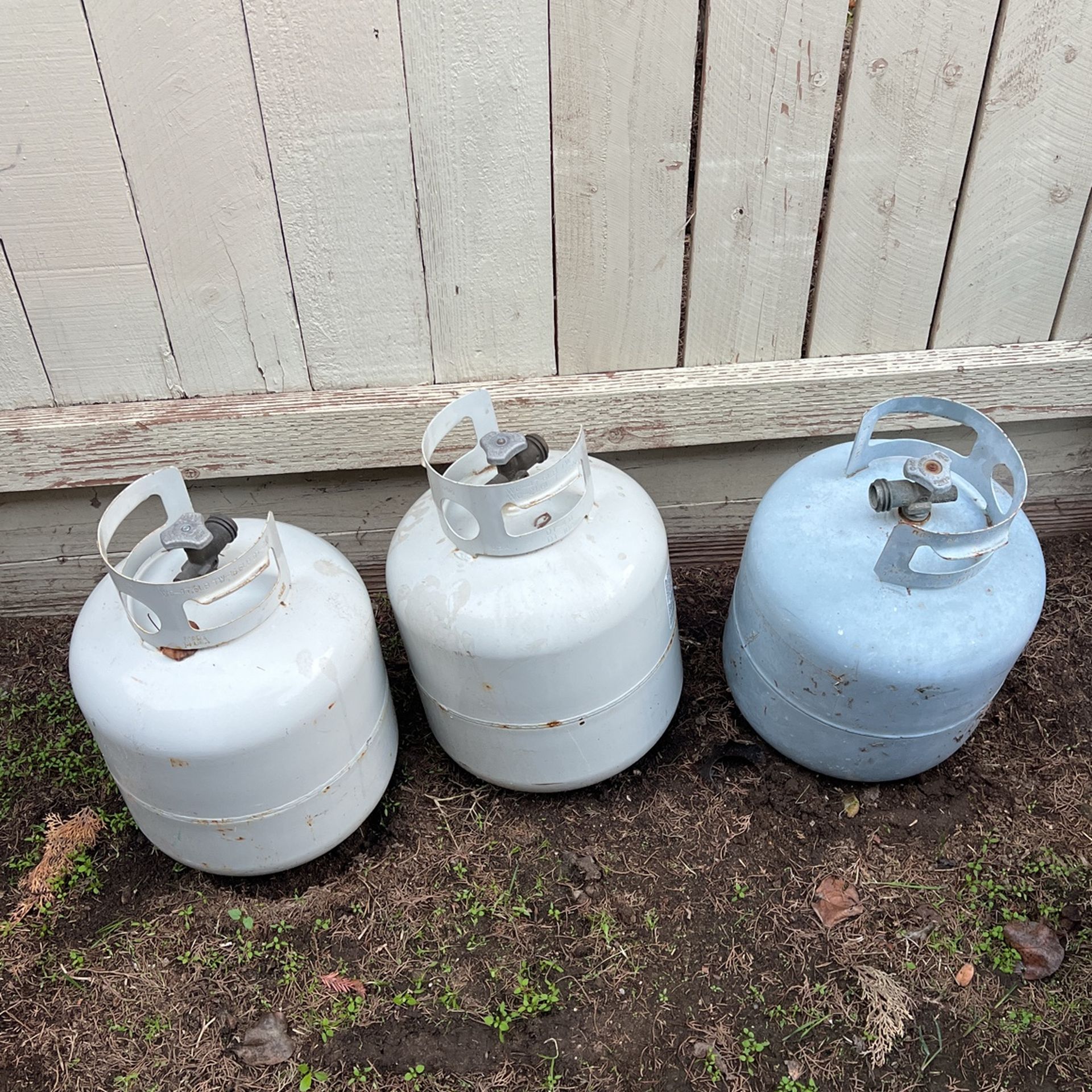 3 Empty Propane Tanks