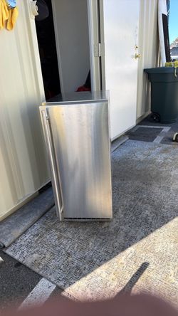 stainless-steel undercounter beverage refrigerator or compact outdoor refrigerator..
