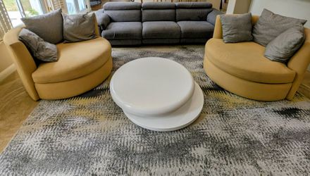 Three seater sofa, 2 swivel chairs, coffee table and rug OBO