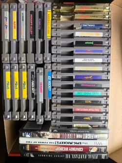 Large Lot of NES Cartridges and More