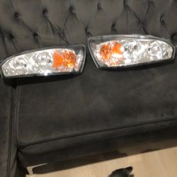 Chevy Malibu  brand New Head Lights 