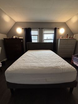 Queen-sized Bed With Mattress And Frame 