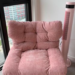Pink armless tufted chair