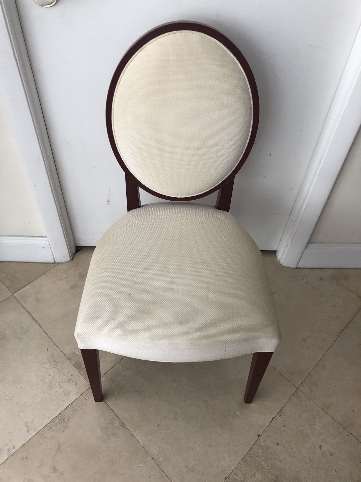 Cream fabric and cherry wood chair