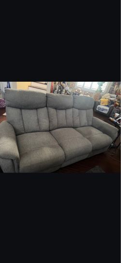 Living Spaces reclining sofa +Free matching chair
