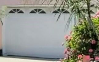 16’ x 7’ Two-Car Garage Door with Chamberlain Opener – $1,200 OBO