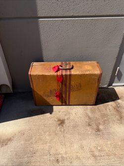 vintage suitcase from brands such as Hartmann