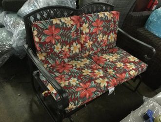 Hampton Bay Oak Cliff Metal Outdoor Glider with flower Cushions
