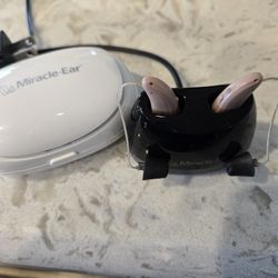 Pair of Miracle-Ear ENERGY Rechargeable Hearing Aids + Charger (Serial: ...1655)
Condition: Pre-owned / Excellent