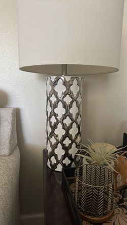 Silver and white lamp