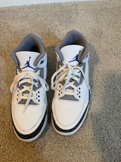 White and blue Jordan 4